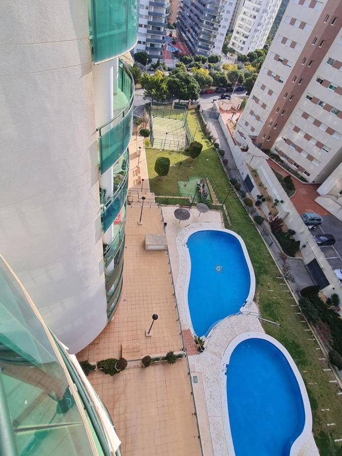 Elegant 2-Bedroom Apartment In Benidorm With Private Pool And Scenic Garden Views كالا دي فينيسترات المظهر الخارجي الصورة